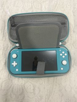 Blue switch light with 2 pokemon games 