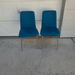 2 Blue Chairs Stackable