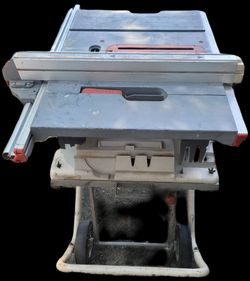Portable RIDGID 10-inch Table Saw mounted on a rolling work stand. This is a heavy-duty, corded electric power saw designed for jobsite https://offeru