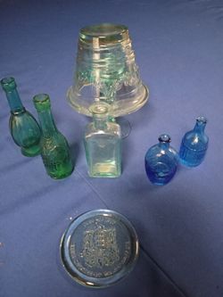 5 different Kinds Bottles With Vintage Glass