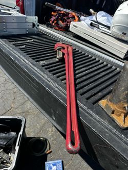heavy-duty straight pipe wrench, potentially a 24-inch or 36-inch model branded