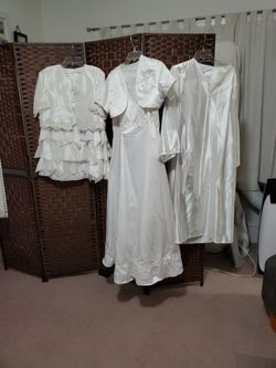 First Communion 2 Dresses Size 14-16.  Avalilable Plus Bible, Rosary,  Veil.