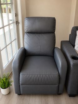 Wade Logan Wide Faux Leather Chair