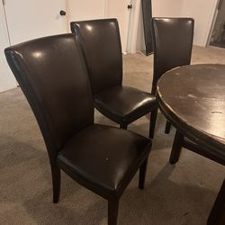 Dining Room Set Leather Seats and Wooden Round Table