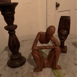 Carved Wood Statues And Candelabra