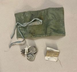 Vintage Military Sewing Kit with Pouch: Vintage military-style sewing kit, often historically referred to as a "housewife" or soldier's roll, likely d