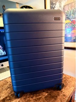 AWAY The Carry-On in Navy Blue Half the retail price