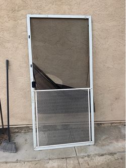Screen door with pet screen