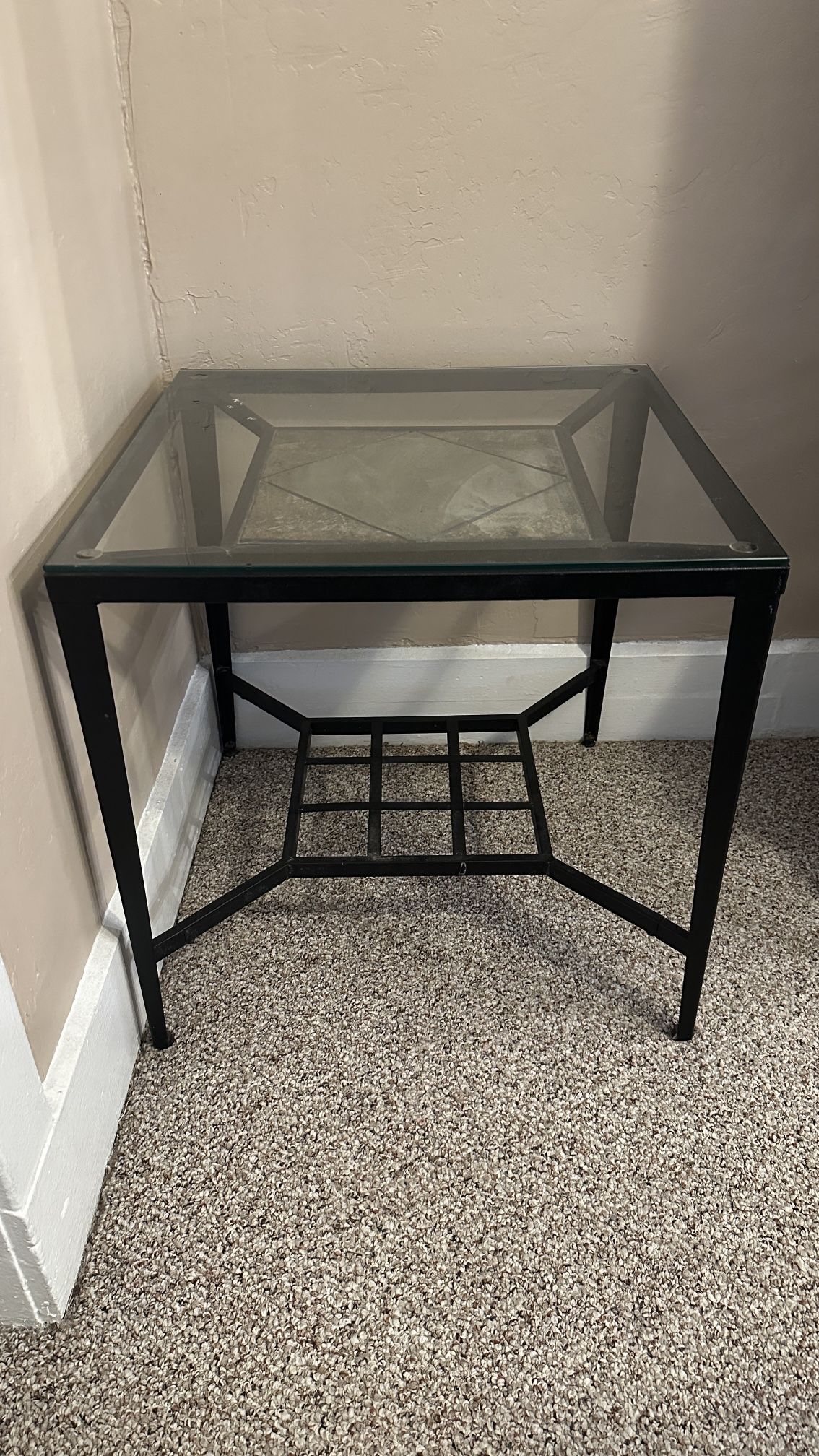 Glass Table with metal legs and shelf