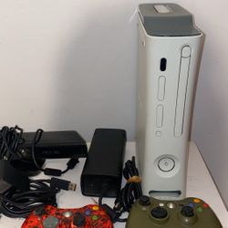 Xbox 360 comes w cords & 2 controllers