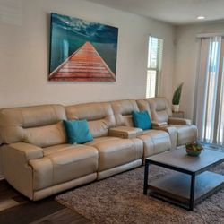 beige leather sofa and table