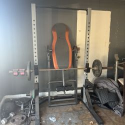 Weights, Olympic Bar, Bench, And Dip Bar