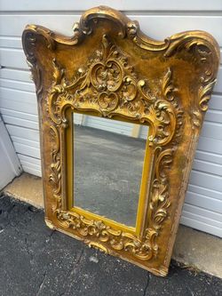 Ornate gold Renaissance mirror.. With engraving from 1966… 43“ x 29” $200