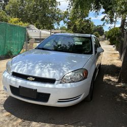 Chevrolet Impala LT Sedan 4D.                     123,500 Miles 
