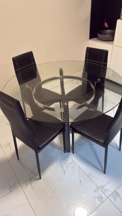 Glass dining table with 4 chairs
