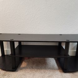 Sleek Black TV Stand – Sturdy & Space-Saving