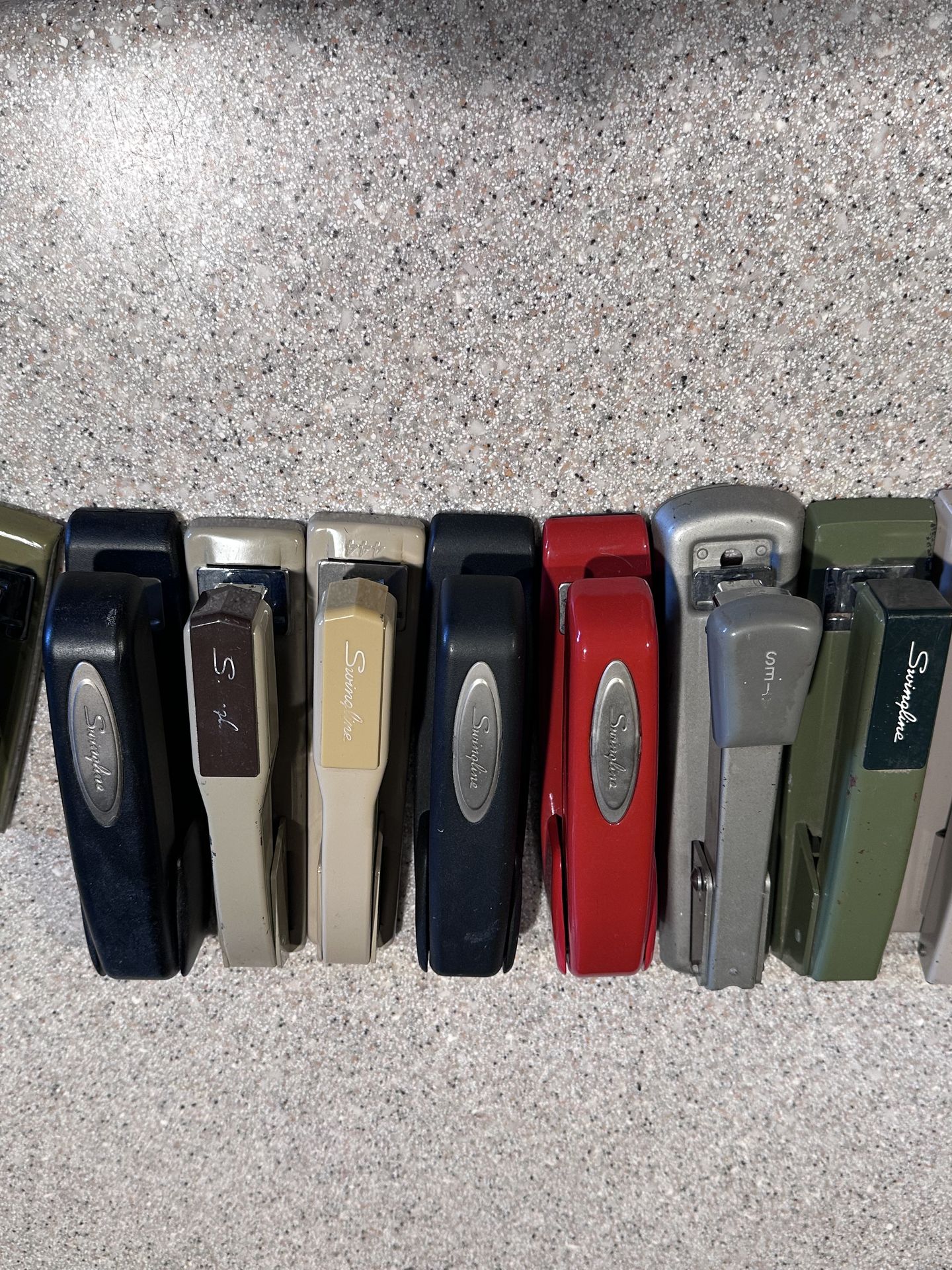 Heavy duty, solid metal, older stapler