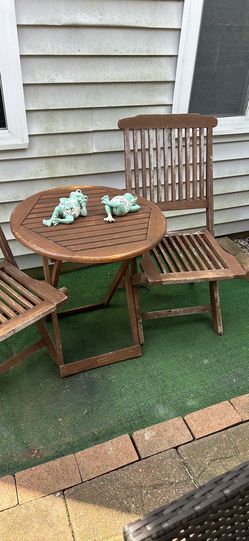3pc Outdoor Interiors Folding Bistro Table patio table set  23.5”diameter x26” h. Still available.
