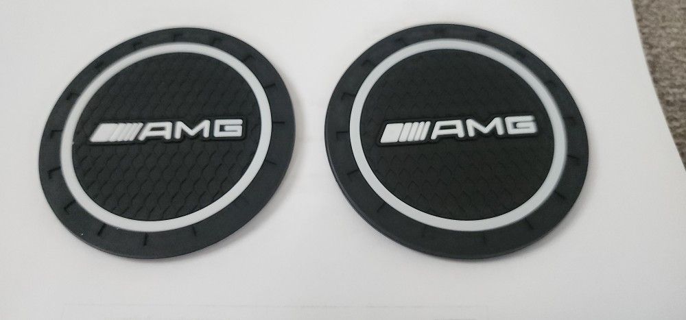2 Mercedes AMG Cupholder Coasters See https://offerup.com/redirect/?o=QWxsLjEyLnBpY3M= Sold Separately