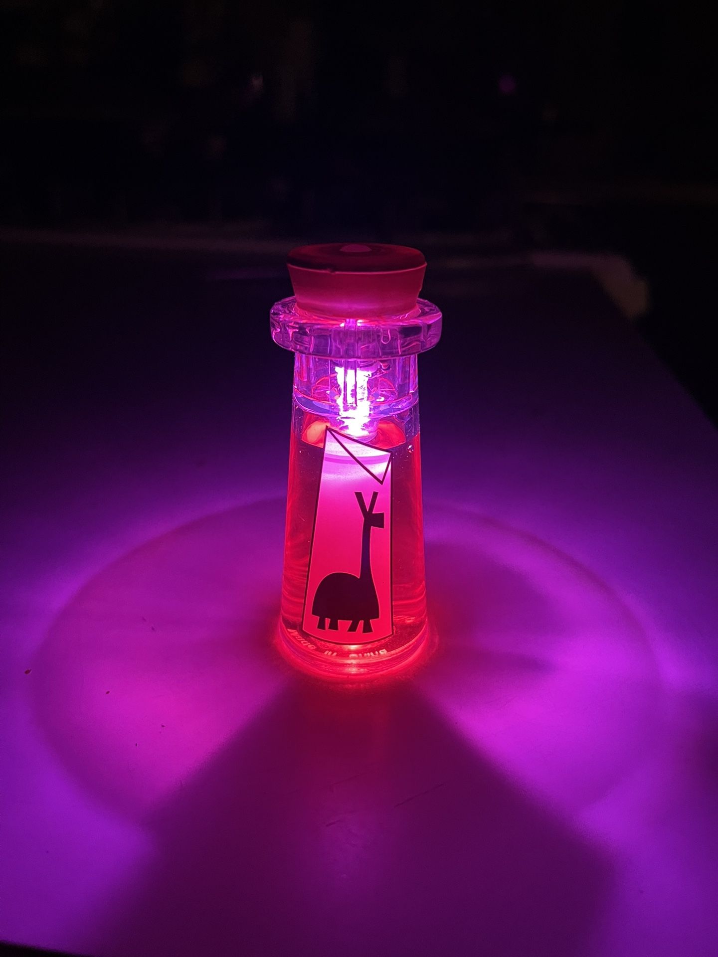 Disney Disneyland Kuzco’s Poison Bottle Glow Cube