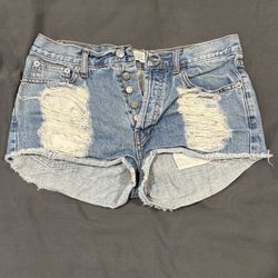 Light blue denim distressed shorts