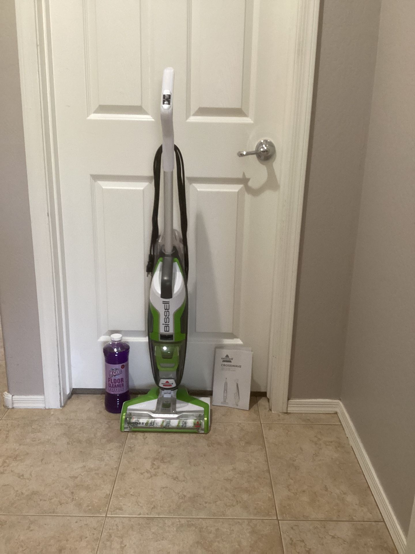 Bissell crosswave hard floor cleaner with an unopened bottle of specialized floor cleaner (nearly new condition)