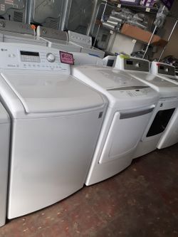 LG top load washer and dryer set working perfectly with 4 months warranty