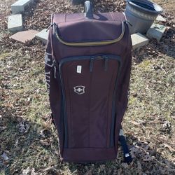 Victorinox Swiss Army Crosslight Wheeled Duffel burgundy used once.