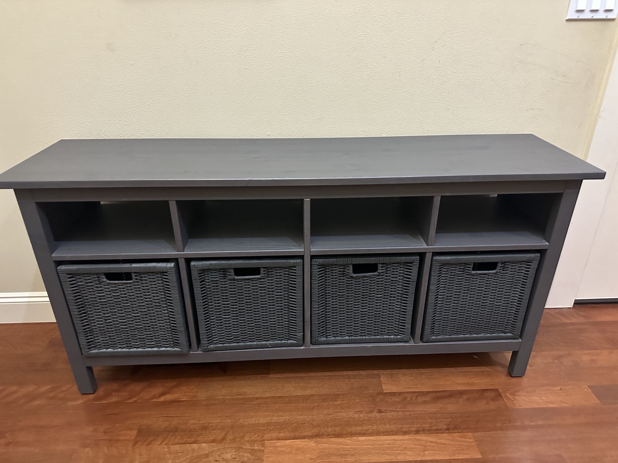 a Hemnes Console Table / TV Unit With 4 Wicker Baskets