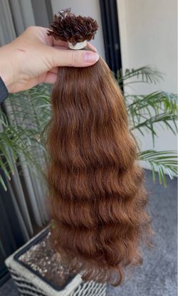 Premium human hair extensions with pre-bonded keratin tips (K-Tips)
