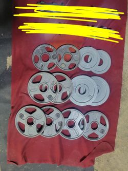 OLYMPIC 2" HOLE.  PLATES 50LBs. TOTAL. 8-5s. 4-2.5s 
11525 S HALSTED /7111.S WESTERN 
45$  CASH ONLY AS IS