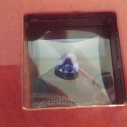 1.50 carat tanzanite trillion cut with paperwork