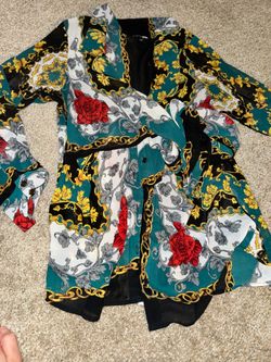 Fashion Nova "Talk To Me" Printed Blouse in the "Green/Combo" colorway.