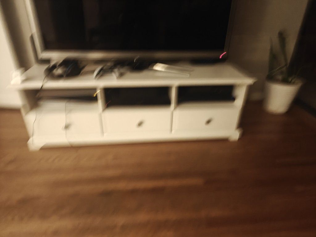 matching IKEA coffee table and entertainment center White