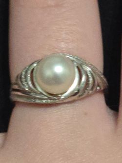 14K white gold Akoyo Pearl rings with small diamond accents.