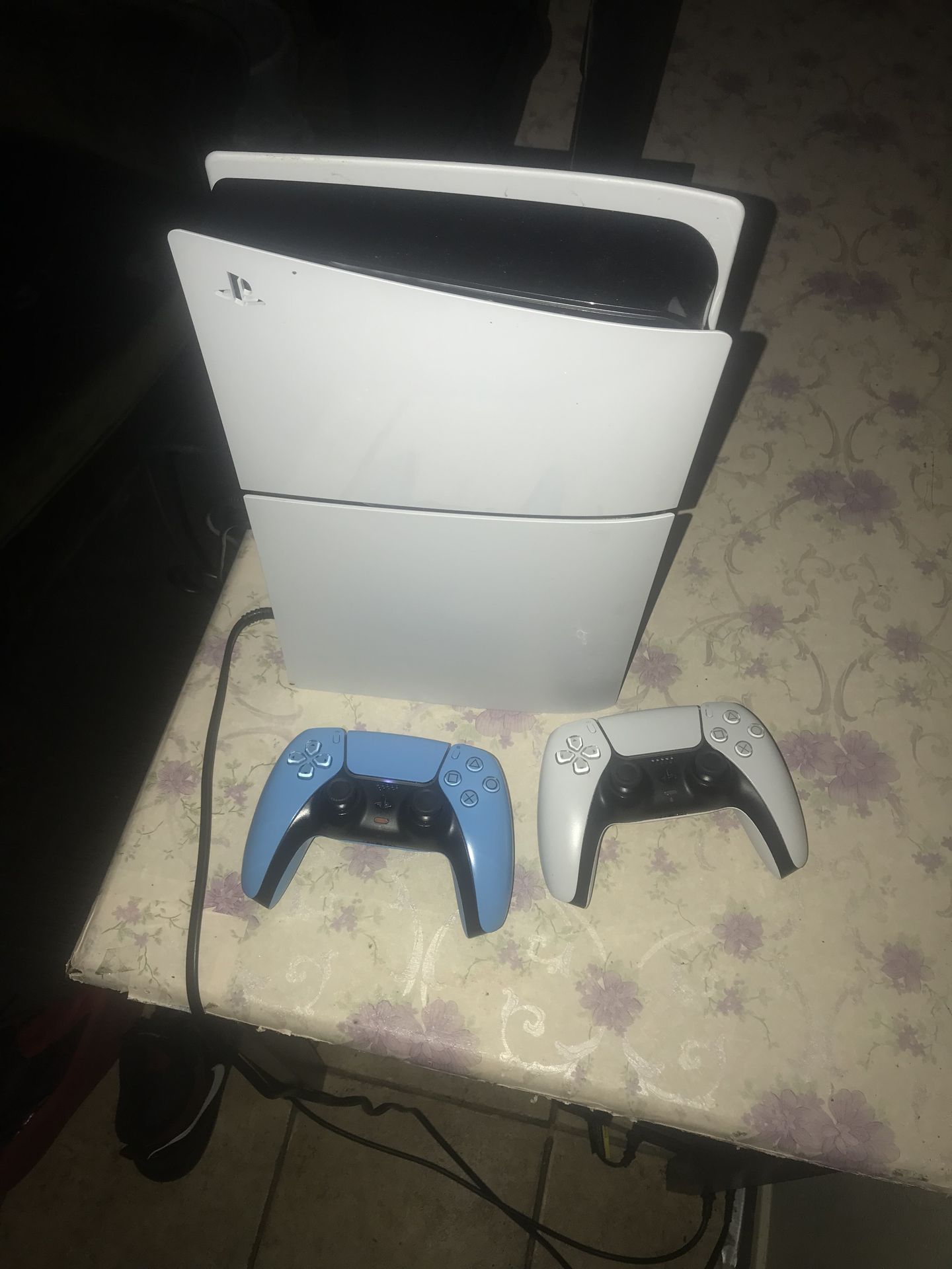 Ps5 with two controllers ,nba2k26, black ops7, and undisputed installed