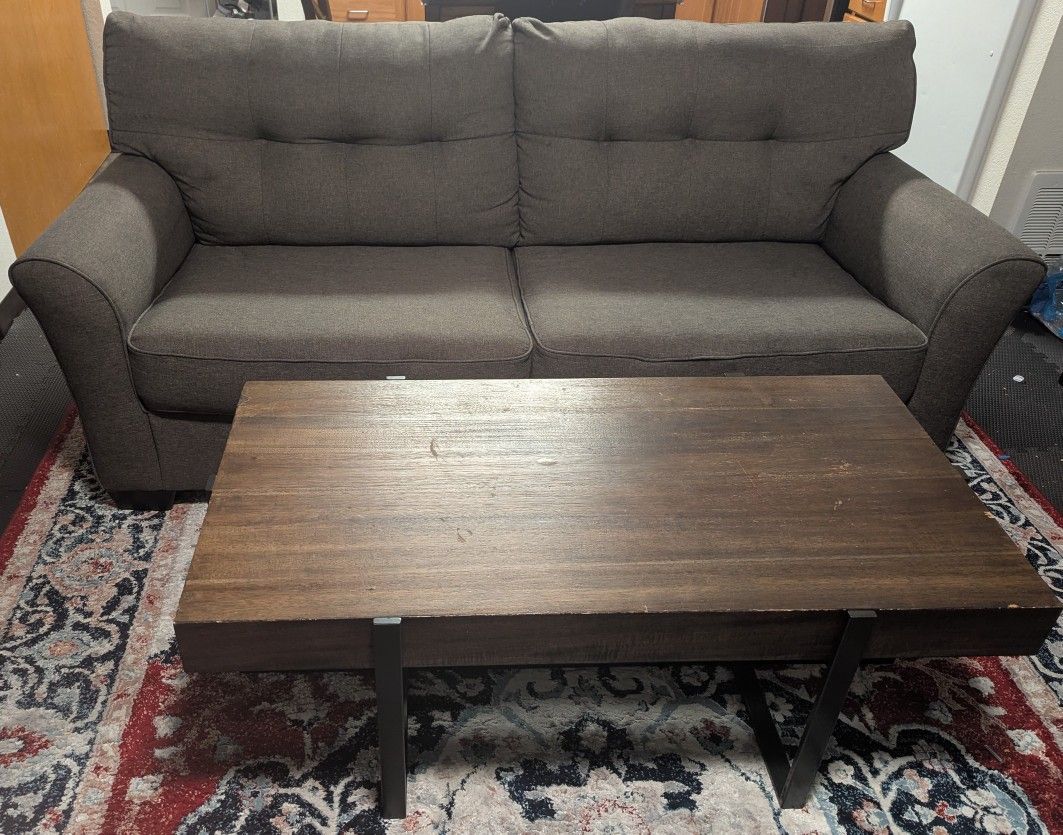 Barely Used Clean Sofa And Strong Coffee Table