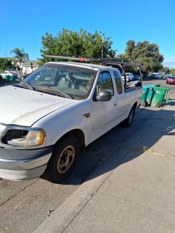 $500 runs  02 f150 high miles perfect wrk truck