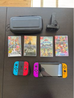 Nintendo Switch Bundle with multiple controllers and games
