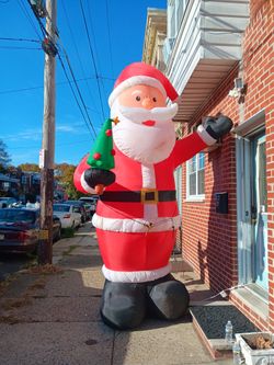 At Least 15 Ft Inflatable Santa Read Description