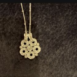Women’s Diamond necklace.
