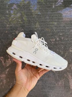 On Cloudnova in all white, model 2