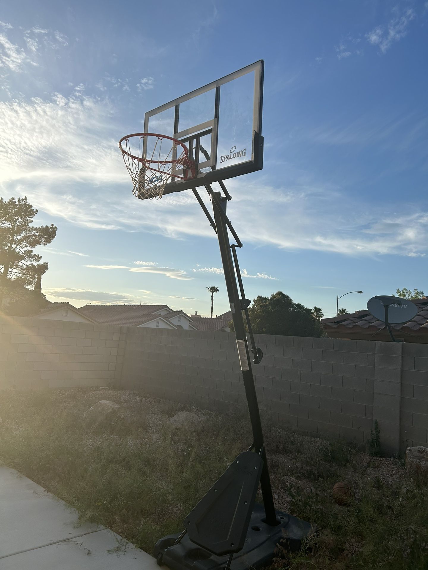 Portable Spalding NCAA Basketball hoop WITH FREE bball