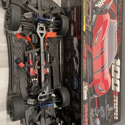 Outcast 6s And Traxxas X01 Everything Included For Both