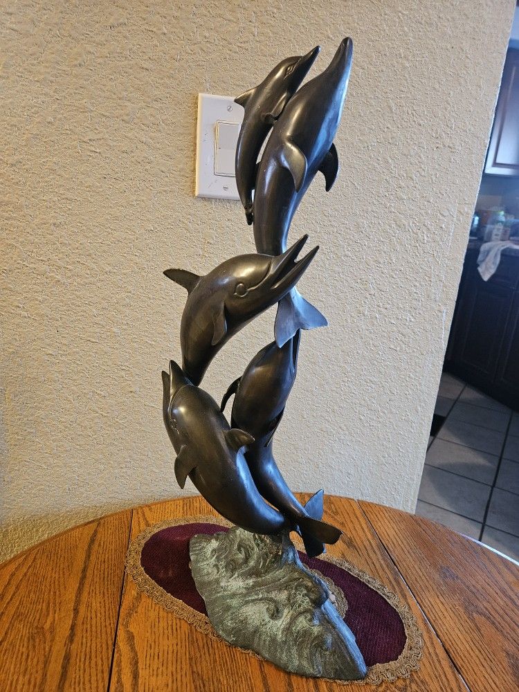 Bronze Family Of Dolphins