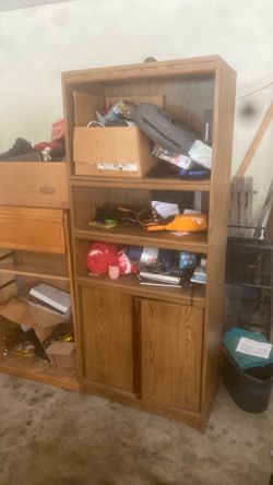 Large bookshelf, items will be removed & unit cleaned