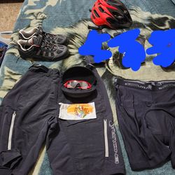 Mtb or Road Riding Apparel with Oakley Glasses and Camelbak Back Pack 