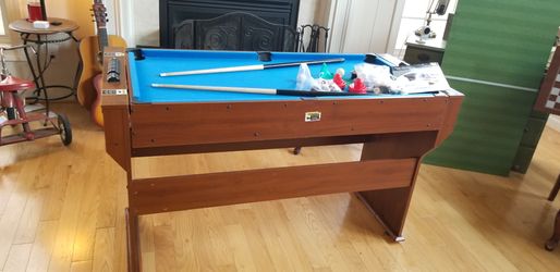 Pool table with free foosball table