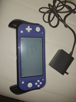 Nintendo Switch Lite with A/C charger & Grip