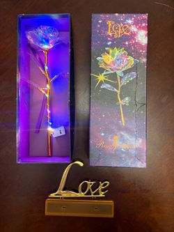 Light up rose with love sign. Comes with box